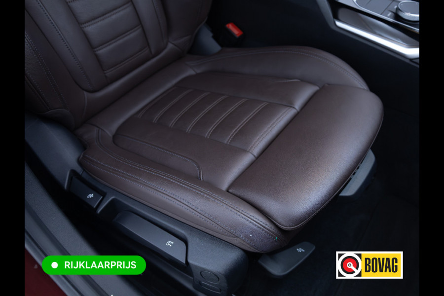 BMW 3 Serie Touring 320e Business Edition Plus | Camera | PDC V+A | Elec. achterklep | Cruise | Navigatie pro | Afn.Trekhaak Apple carplay/Android auto, Lederen bekleding, 18"LMV