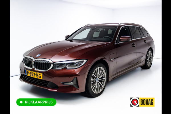 BMW 3 Serie Touring 320e Business Edition Plus | Camera | PDC V+A | Elec. achterklep | Cruise | Navigatie pro | Afn.Trekhaak Apple carplay/Android auto, Lederen bekleding, 18"LMV