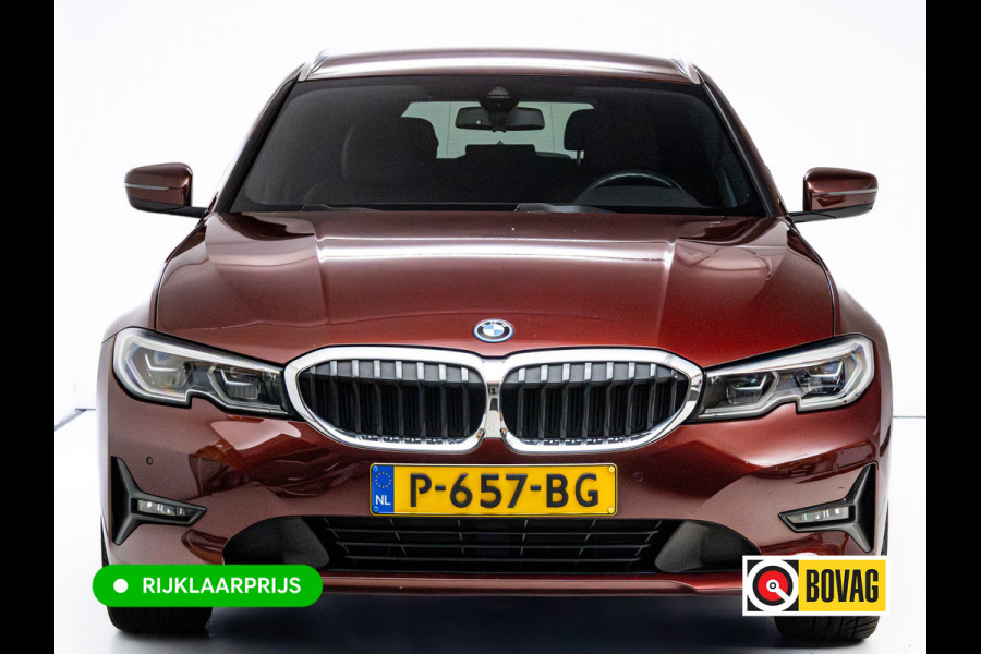 BMW 3 Serie Touring 320e Business Edition Plus | Camera | PDC V+A | Elec. achterklep | Cruise | Navigatie pro | Afn.Trekhaak Apple carplay/Android auto, Lederen bekleding, 18"LMV