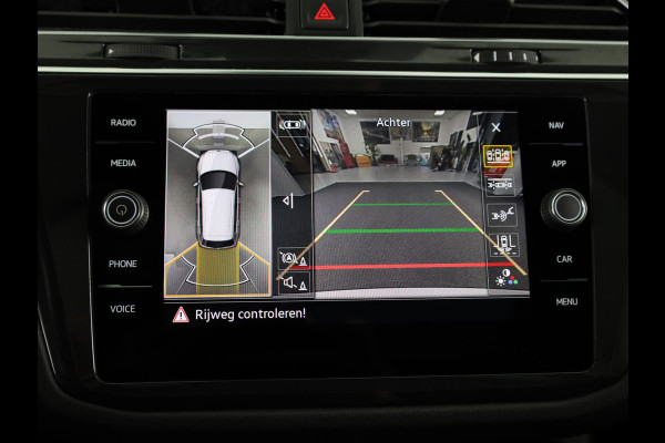 Volkswagen Tiguan 1.4 TSI eHybrid R-Line Business 245 pk Automaat (DSG) | Navigatie | Panoramadak | Parkeersensoren (Park assist) | Rondomzicht camera | Lederen bekleding | Elektr. voorstoelen met geheugen | Black Style pakket | R-Line |