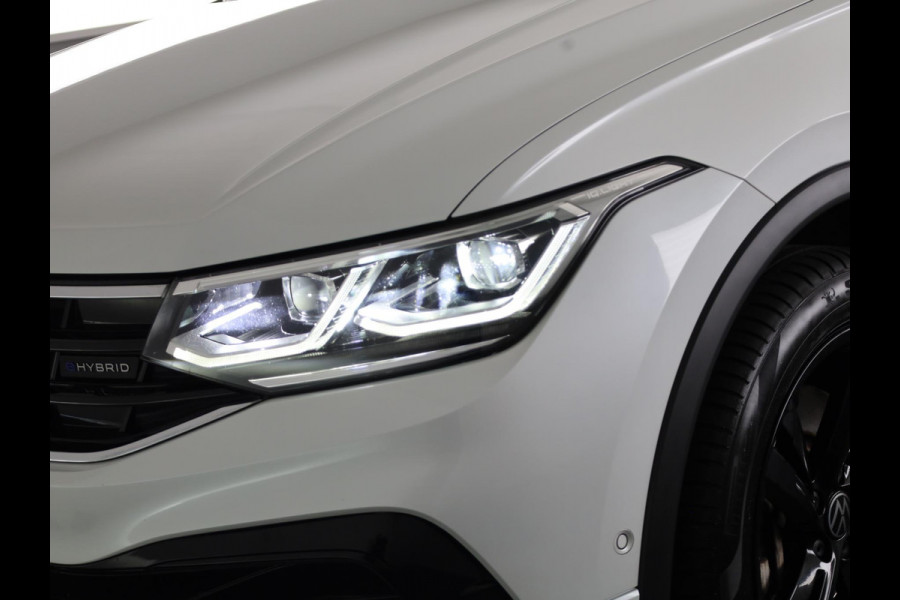 Volkswagen Tiguan 1.4 TSI eHybrid R-Line Business 245 pk Automaat (DSG) | Navigatie | Panoramadak | Parkeersensoren (Park assist) | Rondomzicht camera | Lederen bekleding | Elektr. voorstoelen met geheugen | Black Style pakket | R-Line |