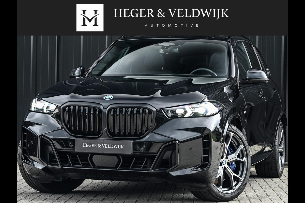 BMW X5 xDrive50e | M-Sport Pro | Alcantara Hemelbekleding | 360 Camera | HUD | Harman/Kardon | Active Steering | Luchtvering | Memory Seat | Stoelverwarming + Ventilatie | Trekhaak | Comfort access | Iconic glow | Ambiance Interieur |
