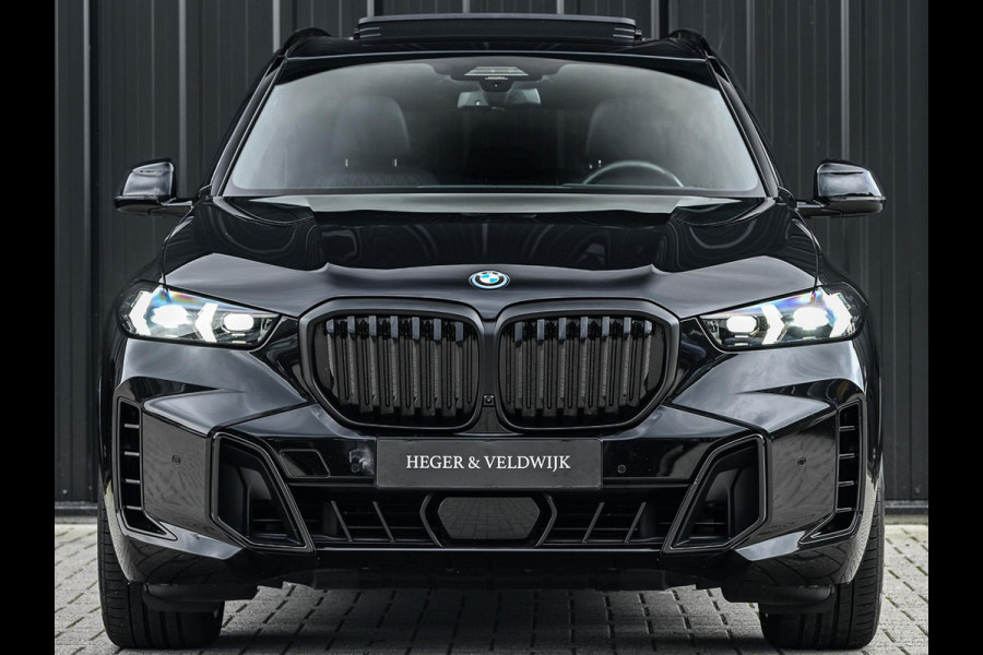 BMW X5 xDrive50e | M-Sport Pro | Alcantara Hemelbekleding | 360 Camera | HUD | Harman/Kardon | Active Steering | Luchtvering | Memory Seat | Stoelverwarming + Ventilatie | Trekhaak | Comfort access | Iconic glow | Ambiance Interieur |