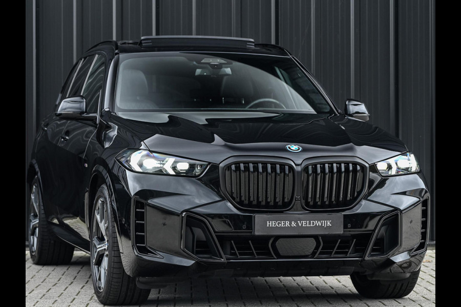 BMW X5 xDrive50e | M-Sport Pro | Alcantara Hemelbekleding | 360 Camera | HUD | Harman/Kardon | Active Steering | Luchtvering | Memory Seat | Stoelverwarming + Ventilatie | Trekhaak | Comfort access | Iconic glow | Ambiance Interieur |