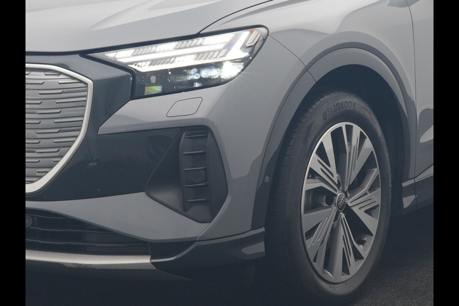 Audi Q4 e-tron 40 S Line 77 kWh 204pk Dealer O.H. | SOH 96,5 % | Trekhaak Af Fabriek | Adaptive Cruise | Head Up | Camera | Matrix LED | Sportstoelen Verwarmd | Sfeerverlichting | BLIS | Keyless | Apple Carplay | Navigatie | DAB | 19"L.M |