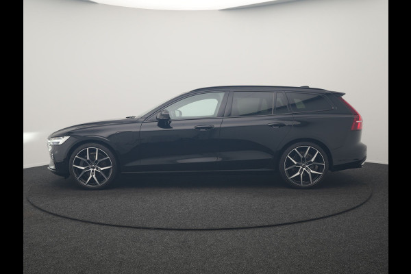 Volvo V60 T6 Recharge AWD R-Design PHEV 340pk Dealer O.H. | SOH 82,8% | Camera | Harman / Kardon | Lederen Sportstoelen Memory & Verwarmd | Stuur Verwarmd | Keyless | BLIS | Cruise Control | Apple Carplay | Navigatie | DAB | 20"L.M | Plug In Hybrid
