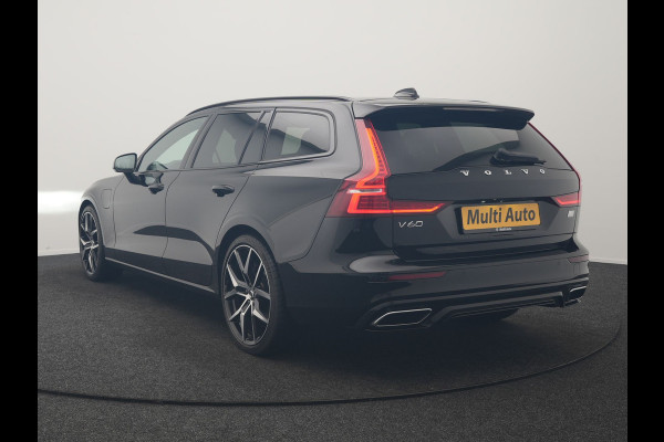Volvo V60 T6 Recharge AWD R-Design PHEV 340pk Dealer O.H. | SOH 82,8% | Camera | Harman / Kardon | Lederen Sportstoelen Memory & Verwarmd | Stuur Verwarmd | Keyless | BLIS | Cruise Control | Apple Carplay | Navigatie | DAB | 20"L.M | Plug In Hybrid