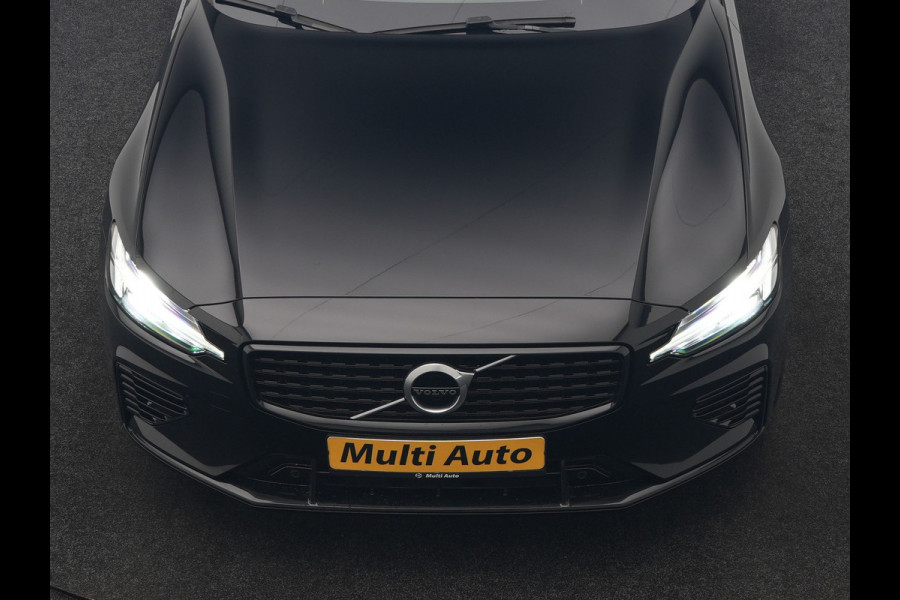Volvo V60 T6 Recharge AWD R-Design PHEV 340pk Dealer O.H. | SOH 82,8% | Camera | Harman / Kardon | Lederen Sportstoelen Memory & Verwarmd | Stuur Verwarmd | Keyless | BLIS | Cruise Control | Apple Carplay | Navigatie | DAB | 20"L.M | Plug In Hybrid