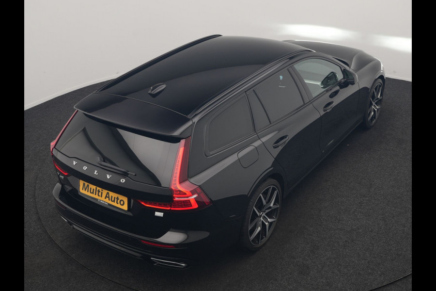 Volvo V60 T6 Recharge AWD R-Design PHEV 340pk Dealer O.H. | SOH 82,8% | Camera | Harman / Kardon | Lederen Sportstoelen Memory & Verwarmd | Stuur Verwarmd | Keyless | BLIS | Cruise Control | Apple Carplay | Navigatie | DAB | 20"L.M | Plug In Hybrid