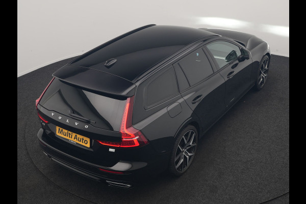 Volvo V60 T6 Recharge AWD R-Design PHEV 340pk Dealer O.H. | SOH 82,8% | Camera | Harman / Kardon | Lederen Sportstoelen Memory & Verwarmd | Stuur Verwarmd | Keyless | BLIS | Cruise Control | Apple Carplay | Navigatie | DAB | 20"L.M | Plug In Hybrid