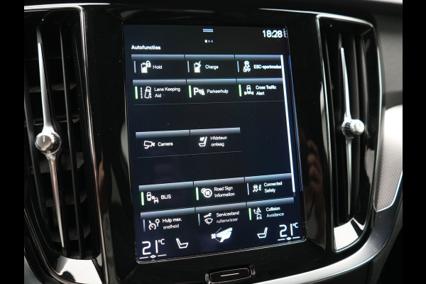 Volvo V60 T6 Recharge AWD R-Design PHEV 340pk Dealer O.H. | SOH 82,8% | Camera | Harman / Kardon | Lederen Sportstoelen Memory & Verwarmd | Stuur Verwarmd | Keyless | BLIS | Cruise Control | Apple Carplay | Navigatie | DAB | 20"L.M | Plug In Hybrid