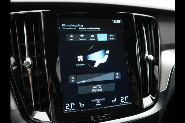 Volvo V60 T6 Recharge AWD R-Design PHEV 340pk Dealer O.H. | SOH 82,8% | Camera | Harman / Kardon | Lederen Sportstoelen Memory & Verwarmd | Stuur Verwarmd | Keyless | BLIS | Cruise Control | Apple Carplay | Navigatie | DAB | 20"L.M | Plug In Hybrid
