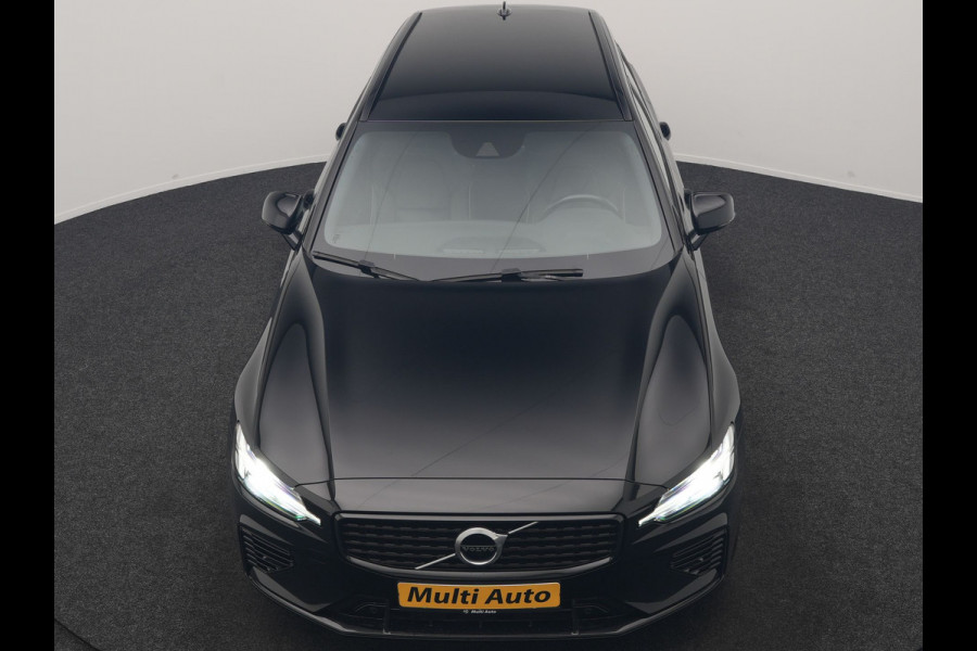 Volvo V60 T6 Recharge AWD R-Design PHEV 340pk Dealer O.H. | SOH 82,8% | Camera | Harman / Kardon | Lederen Sportstoelen Memory & Verwarmd | Stuur Verwarmd | Keyless | BLIS | Cruise Control | Apple Carplay | Navigatie | DAB | 20"L.M | Plug In Hybrid