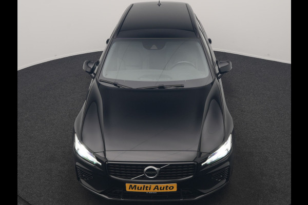 Volvo V60 T6 Recharge AWD R-Design PHEV 340pk Dealer O.H. | SOH 82,8% | Camera | Harman / Kardon | Lederen Sportstoelen Memory & Verwarmd | Stuur Verwarmd | Keyless | BLIS | Cruise Control | Apple Carplay | Navigatie | DAB | 20"L.M | Plug In Hybrid