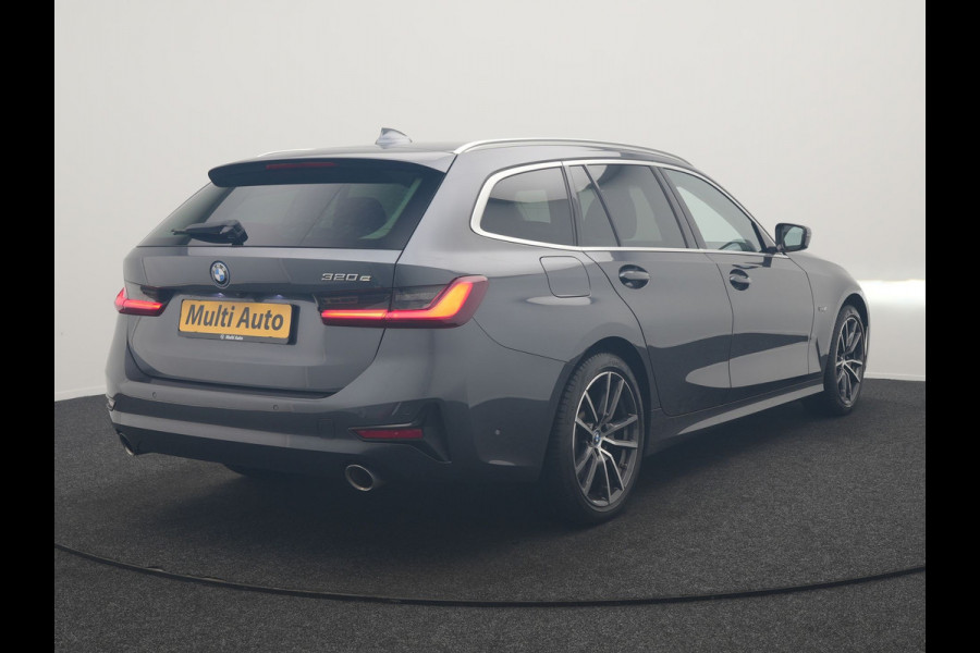 BMW 3 Serie Touring 320e Sportline PHEV Dealer O.H. | SOH 95,4% | Panodak | Adaptive Cruise | Camera | Sfeerverlichting | Sportstoelen Verwarmd | BLIS | Apple Carplay | Navigatie | DAB | Plug In Hybrid |
