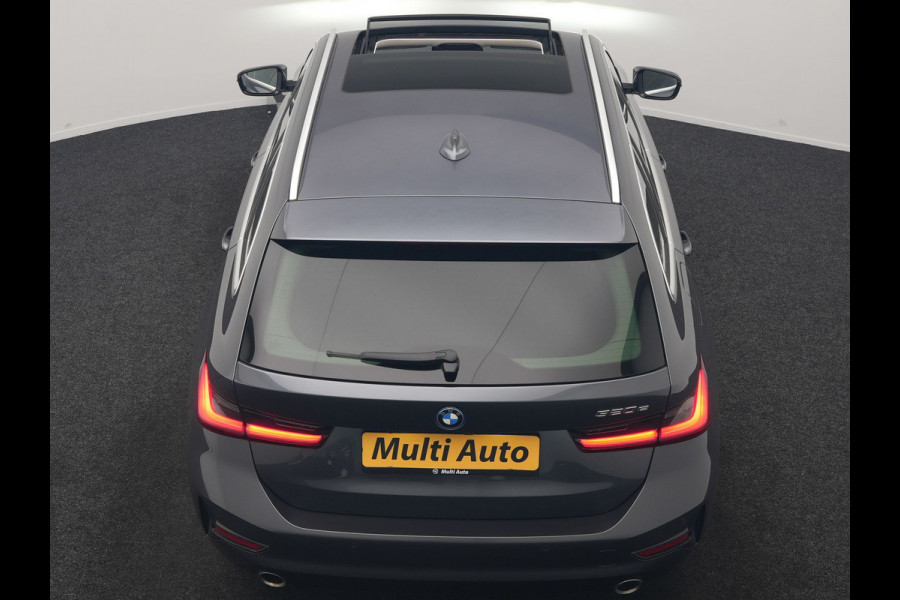 BMW 3 Serie Touring 320e Sportline PHEV Dealer O.H. | SOH 95,4% | Panodak | Adaptive Cruise | Camera | Sfeerverlichting | Sportstoelen Verwarmd | BLIS | Apple Carplay | Navigatie | DAB | Plug In Hybrid |