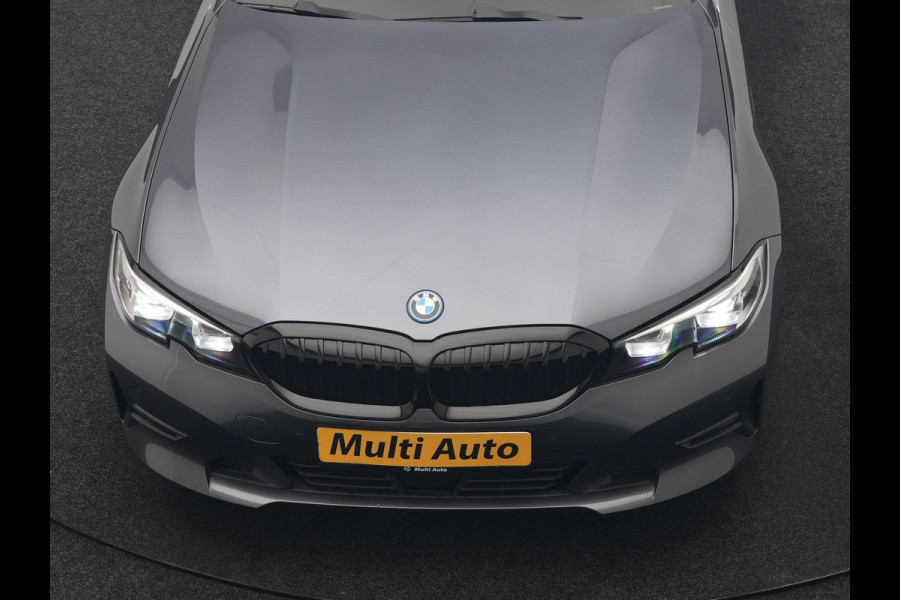BMW 3 Serie Touring 320e Sportline PHEV Dealer O.H. | SOH 95,4% | Panodak | Adaptive Cruise | Camera | Sfeerverlichting | Sportstoelen Verwarmd | BLIS | Apple Carplay | Navigatie | DAB | Plug In Hybrid |