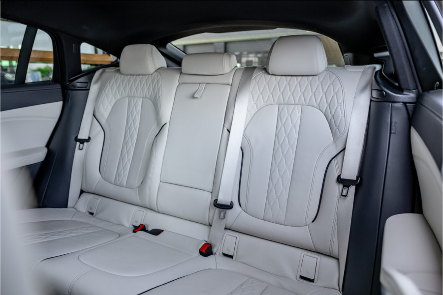 BMW X6 M50i High Executive - M Sport | Panorama | 4-wielsturing | H&K | Soft Close | 360 Camera