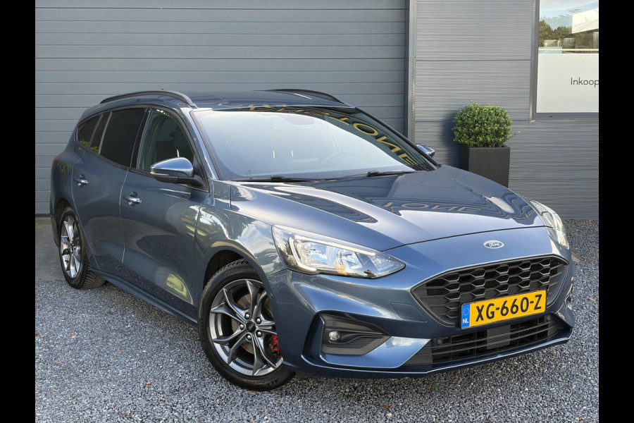 Ford FOCUS Wagon 1.0 EcoBoost ST Line Business ✓2e Eigenaar✓Navi✓Camera✓Carplay✓Afn.Trekhaak✓125pk✓Keyless✓Stoelverw✓Stuurverw✓6 Bak✓Dealer Onderhouden✓17'' Lm velgen✓Pdc V+A✓N.A.P✓Apk tot 02-2027
