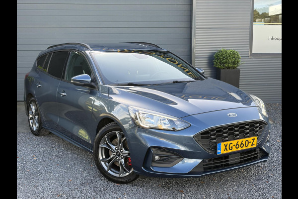 Ford FOCUS Wagon 1.0 EcoBoost ST Line Business ✓2e Eigenaar✓Navi✓Camera✓Carplay✓Afn.Trekhaak✓125pk✓Keyless✓Stoelverw✓Stuurverw✓6 Bak✓Dealer Onderhouden✓17'' Lm velgen✓Pdc V+A✓N.A.P✓Apk tot 02-2027