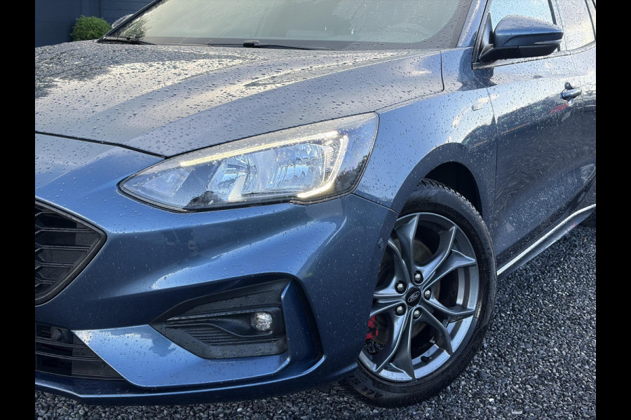 Ford FOCUS Wagon 1.0 EcoBoost ST Line Business ✓2e Eigenaar✓Navi✓Camera✓Carplay✓Afn.Trekhaak✓125pk✓Keyless✓Stoelverw✓Stuurverw✓6 Bak✓Dealer Onderhouden✓17'' Lm velgen✓Pdc V+A✓N.A.P✓Apk tot 02-2027