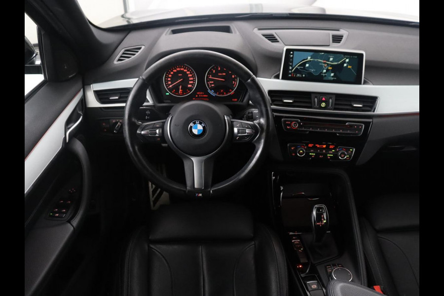 BMW X1 sDrive20i High Executive M-sport | Leder | Memory | Harman/Kardon | Head-up | Cruise control | Stoelverwarming | Climate control | Navigatie | Bluetooth | Park assist | Elektrische achterklep