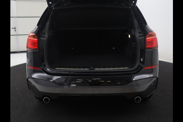BMW X1 sDrive20i High Executive M-sport | Leder | Memory | Harman/Kardon | Head-up | Cruise control | Stoelverwarming | Climate control | Navigatie | Bluetooth | Park assist | Elektrische achterklep