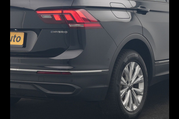 Volkswagen Tiguan 1.4 TSI eHybrid PHEV 245pk Dealer O.H. | SOH 92,8% | Trekhaak Af Fabriek | Panodak | Adaptive Cruise | Sportstoelen & Stuur Verwarmd | Sfeerverlichting | BLIS | Apple Carplay | Navigatie | DAB | Plug In Hybrid |