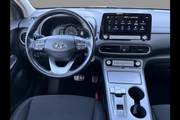 Hyundai Kona EV Fashion 39 kWh SoH 89.9% | 3 Fase | Warmtepomp | Fabrieksgarantie | Camera | Navigatie | Adaptieve Cruise | Dealeronderhouden |
