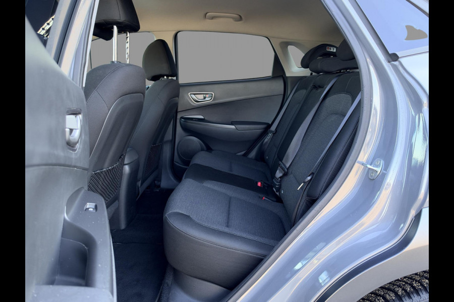 Hyundai Kona EV Fashion 39 kWh SoH 89.9% | 3 Fase | Warmtepomp | Fabrieksgarantie | Camera | Navigatie | Adaptieve Cruise | Dealeronderhouden |