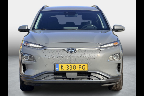 Hyundai Kona EV Fashion 39 kWh SoH 89.9% | 3 Fase | Warmtepomp | Fabrieksgarantie | Camera | Navigatie | Adaptieve Cruise | Dealeronderhouden |