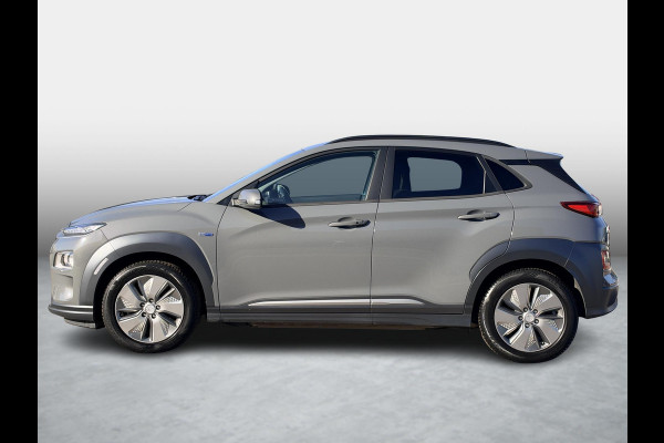 Hyundai Kona EV Fashion 39 kWh SoH 89.9% | 3 Fase | Warmtepomp | Fabrieksgarantie | Camera | Navigatie | Adaptieve Cruise | Dealeronderhouden |