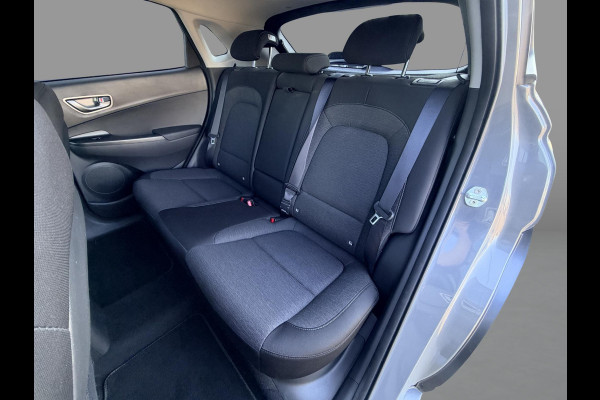 Hyundai Kona EV Fashion 39 kWh SoH 89.9% | 3 Fase | Warmtepomp | Fabrieksgarantie | Camera | Navigatie | Adaptieve Cruise | Dealeronderhouden |