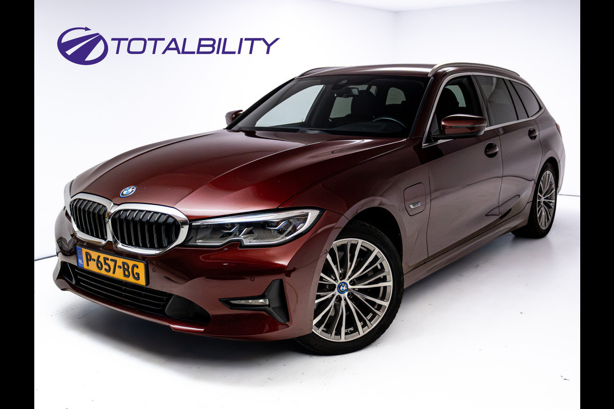 BMW 3 Serie Touring 320e Business Edition Plus | Camera | PDC V+A | Elec. achterklep | Cruise | Navigatie pro | Afn.Trekhaak Apple carplay/Android auto, Lederen bekleding, 18"LMV