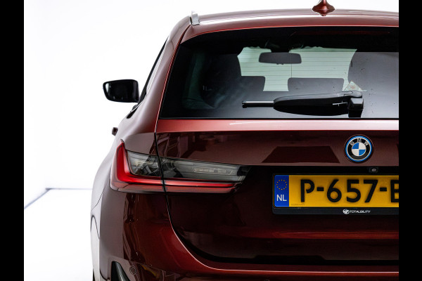BMW 3 Serie Touring 320e Business Edition Plus | Camera | PDC V+A | Elec. achterklep | Cruise | Navigatie pro | Afn.Trekhaak Apple carplay/Android auto, Lederen bekleding, 18"LMV