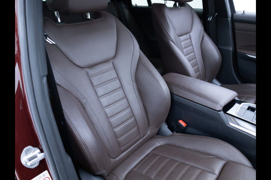 BMW 3 Serie Touring 320e Business Edition Plus | Camera | PDC V+A | Elec. achterklep | Cruise | Navigatie pro | Afn.Trekhaak Apple carplay/Android auto, Lederen bekleding, 18"LMV