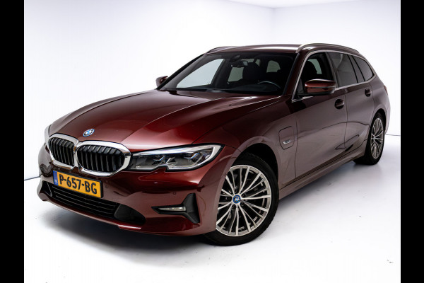 BMW 3 Serie Touring 320e Business Edition Plus | Camera | PDC V+A | Elec. achterklep | Cruise | Navigatie pro | Afn.Trekhaak Apple carplay/Android auto, Lederen bekleding, 18"LMV