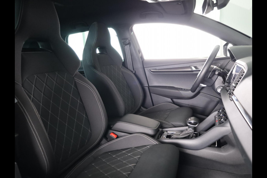 Škoda Karoq 1.5 TSI ACT Sportline Business 150 pk Automaat (DSG) | Verlengde garantie | Navigatie via App | Parkeersensoren | Achteruitrijcamera | Adaptieve cruise control | Stoelverwarming v/a | Verwarmde voorruit |