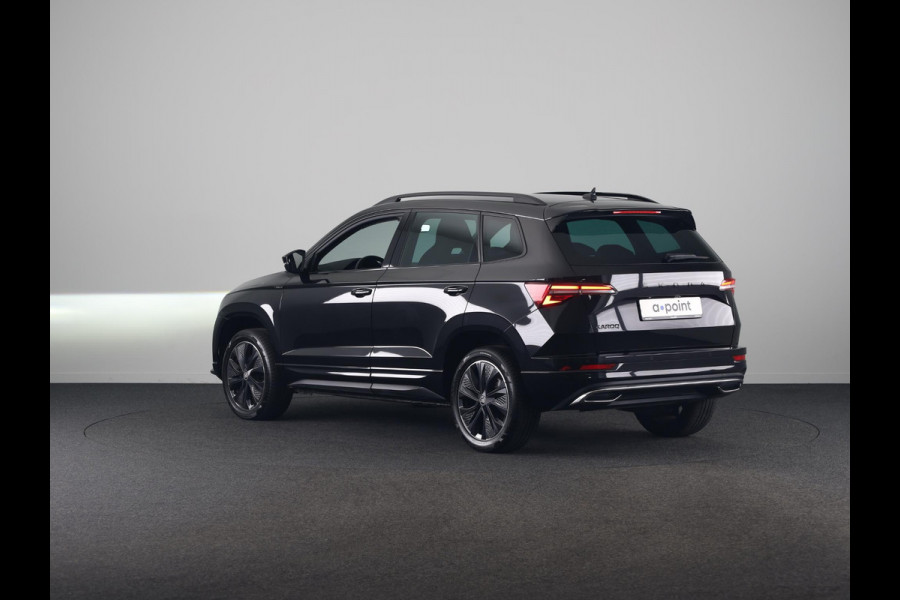 Škoda Karoq 1.5 TSI ACT Sportline Business 150 pk Automaat (DSG) | Verlengde garantie | Navigatie via App | Parkeersensoren | Achteruitrijcamera | Adaptieve cruise control | Stoelverwarming v/a | Verwarmde voorruit |