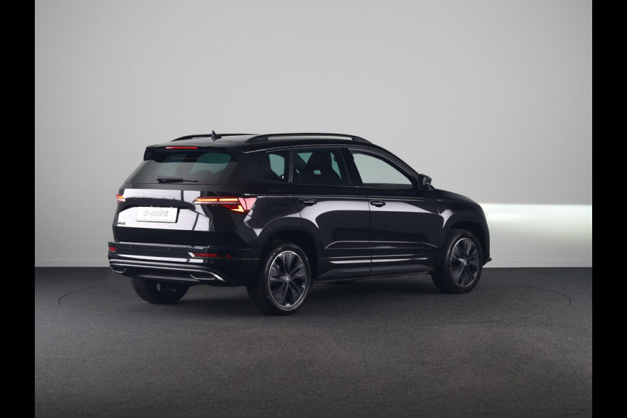 Škoda Karoq 1.5 TSI ACT Sportline Business 150 pk Automaat (DSG) | Verlengde garantie | Navigatie via App | Parkeersensoren | Achteruitrijcamera | Adaptieve cruise control | Stoelverwarming v/a | Verwarmde voorruit |