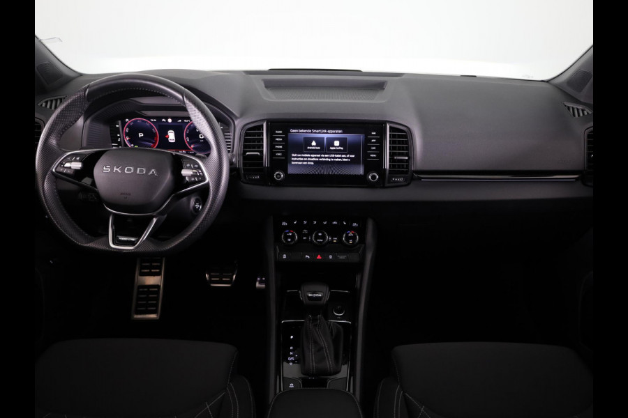 Škoda Karoq 1.5 TSI ACT Sportline Business 150 pk Automaat (DSG) | Verlengde garantie | Navigatie via App | Parkeersensoren | Achteruitrijcamera | Adaptieve cruise control | Stoelverwarming v/a | Verwarmde voorruit |