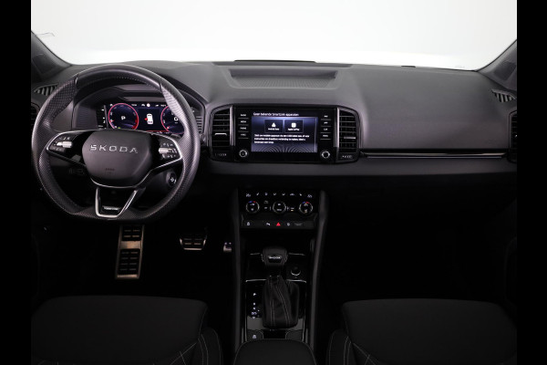 Škoda Karoq 1.5 TSI ACT Sportline Business 150 pk Automaat (DSG) | Verlengde garantie | Navigatie via App | Parkeersensoren | Achteruitrijcamera | Adaptieve cruise control | Stoelverwarming v/a | Verwarmde voorruit |