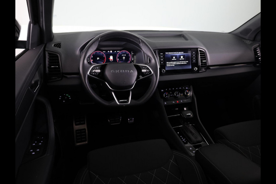 Škoda Karoq 1.5 TSI ACT Sportline Business 150 pk Automaat (DSG) | Verlengde garantie | Navigatie via App | Parkeersensoren | Achteruitrijcamera | Adaptieve cruise control | Stoelverwarming v/a | Verwarmde voorruit |