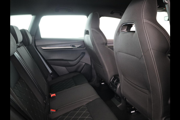 Škoda Karoq 1.5 TSI ACT Sportline Business 150 pk Automaat (DSG) | Verlengde garantie | Navigatie via App | Parkeersensoren | Achteruitrijcamera | Adaptieve cruise control | Stoelverwarming v/a | Verwarmde voorruit |