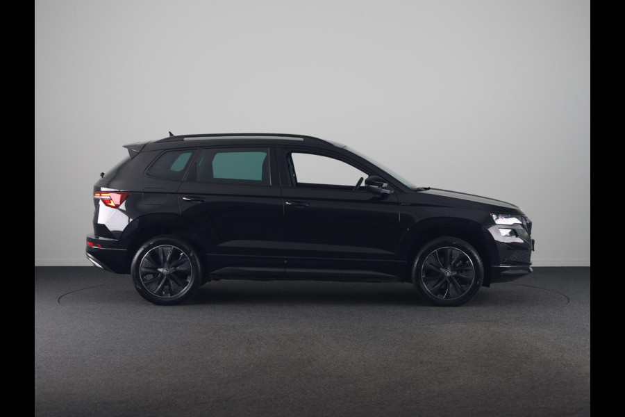 Škoda Karoq 1.5 TSI ACT Sportline Business 150 pk Automaat (DSG) | Verlengde garantie | Navigatie via App | Parkeersensoren | Achteruitrijcamera | Adaptieve cruise control | Stoelverwarming v/a | Verwarmde voorruit |