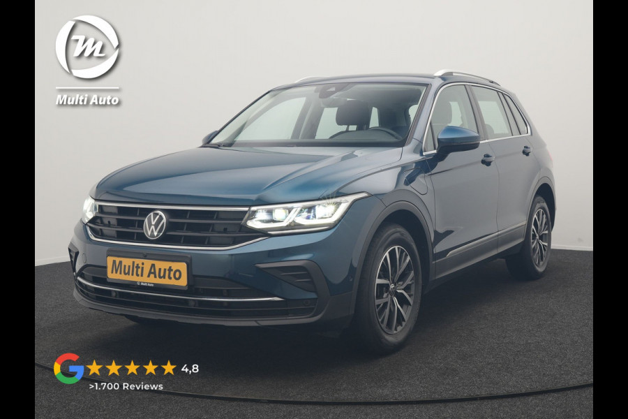 Volkswagen Tiguan 1.4 TSI eHybrid Life PHEV 245pk Dealer O.H. | SOH 97,6% | Trekhaak Af Fabriek | Adaptive Cruise | 360 Camera | IQ Light | Stoelen & Stuur Verwarmd | Keyless | BLIS | Apple Carplay | Navigatie | DAB | Plug In Hybrid |