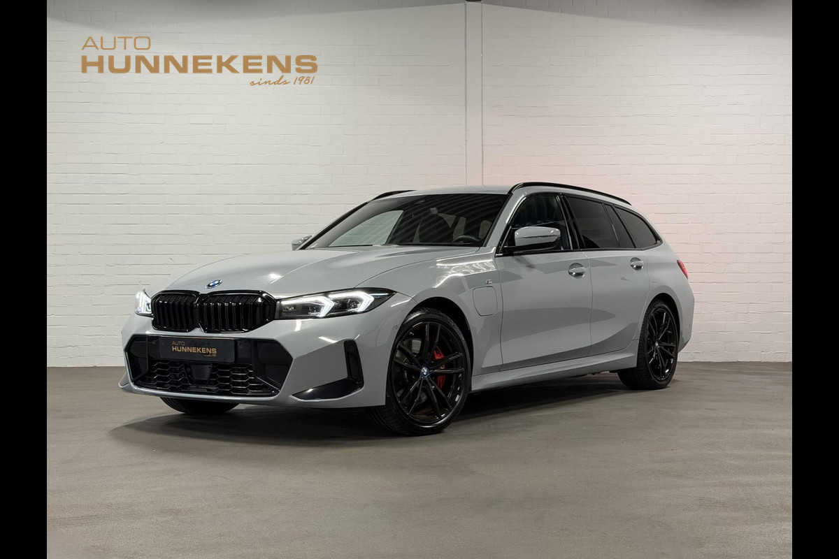 BMW 3 Serie Touring 330e M-Sportpakket | Adapt. Cruise | Stoelverwarming | Sfeerverlichting | Dodehoek | Memory | Head up | Matrix led |