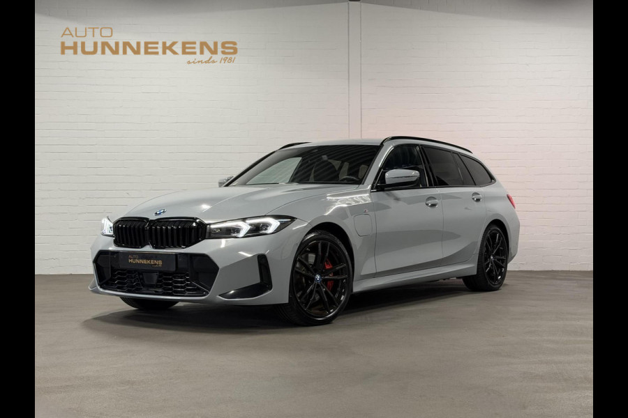 BMW 3 Serie Touring 330e M-Sportpakket | Adapt. Cruise | Stoelverwarming | Sfeerverlichting | Dodehoek | Memory | Head up | Matrix led |