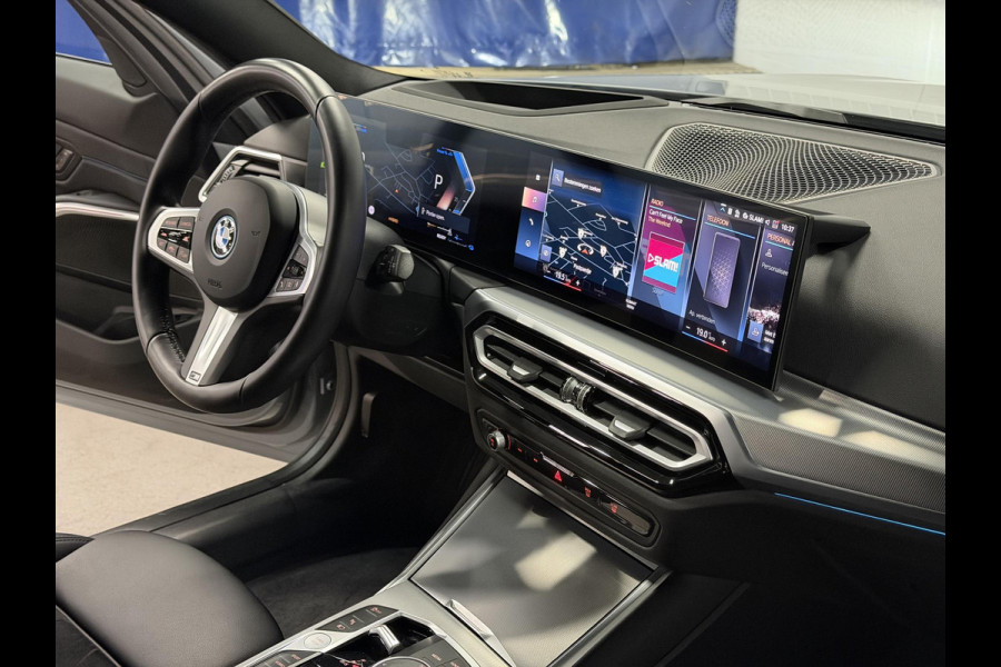 BMW 3 Serie Touring 330e M-Sportpakket | Adapt. Cruise | Stoelverwarming | Sfeerverlichting | Dodehoek | Memory | Head up | Matrix led |