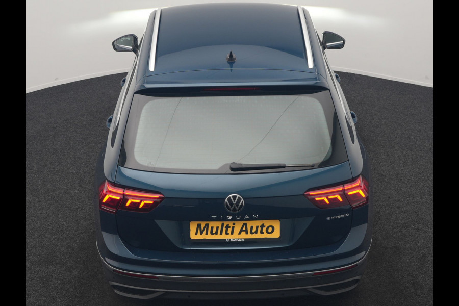 Volkswagen Tiguan 1.4 TSI eHybrid Life PHEV 245pk Dealer O.H. | SOH 97,6% | Trekhaak Af Fabriek | Adaptive Cruise | 360 Camera | IQ Light | Stoelen & Stuur Verwarmd | Keyless | BLIS | Apple Carplay | Navigatie | DAB | Plug In Hybrid |